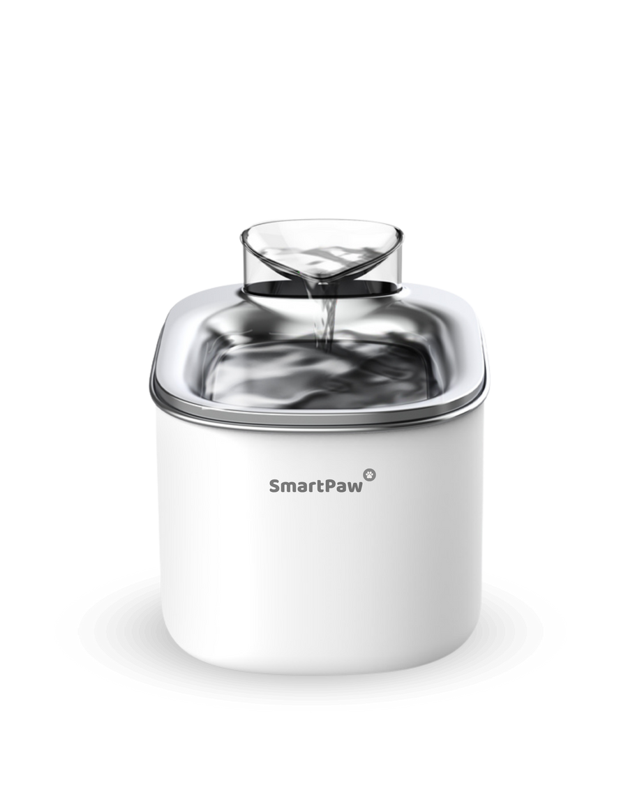 The white SmartPaw FlowMate Pro fountain with water flowing into its stainless steel bowl